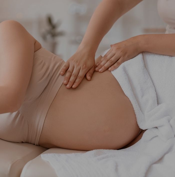 Massaging a Pregnant Woman Sideways